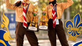 Zaldian Azka Rahmatullah (8D) dan Ghefira Tsaury Alfhatunnisa (8B) berpose bersama trofi hasil perjuangan mereka pada ajang LA-GALAKSI X Tahun 2026.